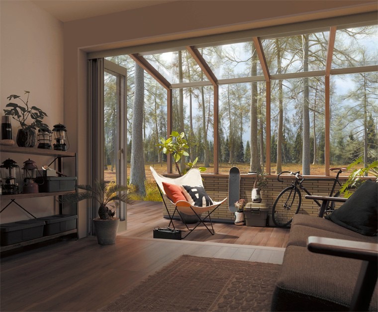 LIXIL　ひさし　軒下　縁側　ガーデンスペース　ガーデンルーム　ワンランク上　モダン　 おしゃれ　エクステリア　愛知・名古屋の外構専門店パートナーホームのエクステリア　製品一覧　ココマ　遊び心いっぱいの空間にしたい。 チェリーウッド色が醸し出すぬくもりに包まれ、両サイドがオープンになった空間に、ランタンや観葉植物、バイクなどのお気に入りアイテムを、汚れを気にせず配置。 カジュアルに使いこなせるココマです。|パートナーホーム