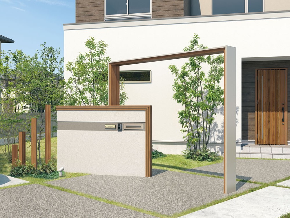 三協アルミ　門まわり装飾　フィオーレ【外構エクステリア商品】|サムネイル　三協アルミ　モダン　おしゃれ　エクステリア　愛知・名古屋の外構専門店パートナーホームのエクステリア　製品一覧　門まわり装飾　フィオーレ　 たて材付きデザイン笠木／アーチ（門タイプ：内側木調）／枕木材（マクリズム） たて材付きデザイン笠木／アーチ（門タイプ：内側木調）／枕木材（マクリズム） 玄関ドアと合わせた明るい木調色の笠木やアーチ・枕木材の組み合わせで、エントランスを賑やかにコーディネート。 笠木・アーチ：YCU（クラフトチェリー・アーバングレー）／枕木材：クラフトチェリー|パートナーホーム