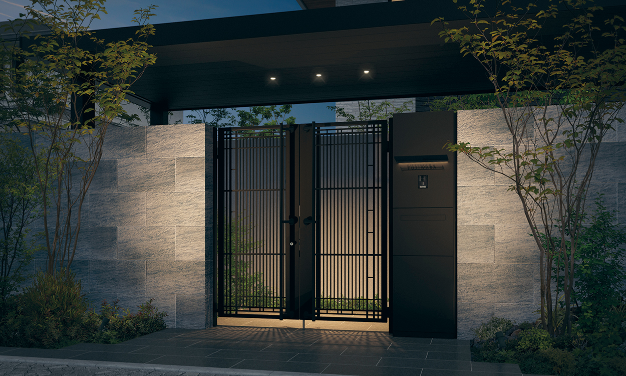 三協アルミ　モダン　おしゃれ　エクステリア　愛知・名古屋の外構専門店パートナーホームのエクステリア　製品一覧　機能門柱　ジオグランテ　 門扉取り付け仕様 門扉取り付け仕様 アートブラック／インターホンパネル〈インターホンあり〉／扉パネル〈宅配ボックスあり〉／表札〈KPｰKMGｰCMｰ1：ブラック〉／宅配ボックス〈STBｰMN2・R：ブラック〉／専用表札灯／門柱連結部品セット／門扉：ジオグランテ1型（両開き）／隣接壁スペーサー（隣接壁同面納まり用）|パートナーホーム