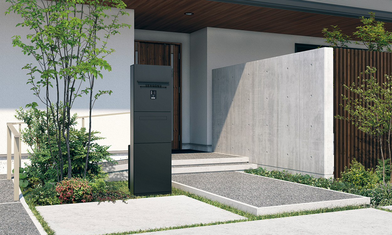 三協アルミ　モダン　おしゃれ　エクステリア　愛知・名古屋の外構専門店パートナーホームのエクステリア　製品一覧　機能門柱　ジオグランテ　 独立仕様 アートブラック／インターホンパネル〈インターホンあり〉／扉パネル〈宅配ボックスあり〉／表札〈KPｰKMGｰCMｰ1：ブラック〉／宅配ボックス〈STBｰMN2・R：ブラック〉／専用表札灯|パートナーホーム