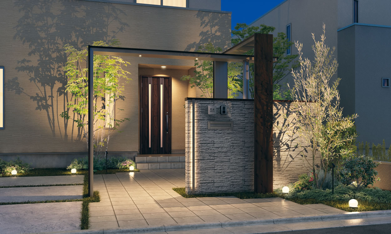 三協アルミ　モダン　おしゃれ　エクステリア　愛知・名古屋の外構専門店パートナーホームのエクステリア　製品一覧　門まわり装飾　フィオーレ　 アーチ（Lタイプ：外側木調）／アーチ（門タイプ：外側木調）／ブロック笠木＜Night Scene＞ アーチ（Lタイプ：外側木調）／アーチ（門タイプ：外側木調）／ブロック笠木＜Night Scene＞ シンプルな外観に木調色が映えるアーチは、2つをクロスした立体的な演出で存在感のあるエントランスに。|パートナーホーム