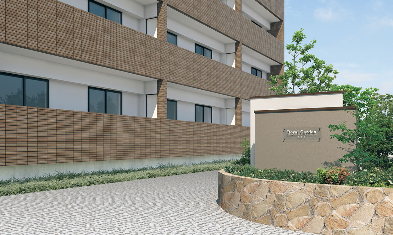 三協アルミ　モダン　おしゃれ　エクステリア　愛知・名古屋の外構専門店パートナーホームのエクステリア　製品一覧　門まわり装飾　フィオーレ　 ブロック笠木 ブロック笠木 アパートのアプローチをシャープなラインを活かしたデザインでスタイリッシュに演出。 FAC（トラッドオーク・ダークブロンズ）|パートナーホーム