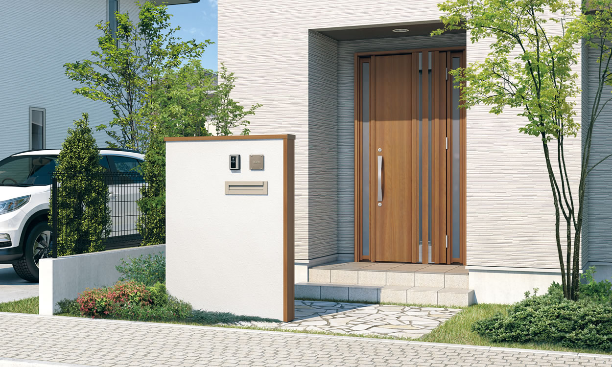 ブロック笠木・ブロックたて枠 ブロック笠木・ブロックたて枠 自然な色合いの木調色。玄関ドアと合わせた優しいコーディネート。 YCC（クラフトチェリー・ダークブロンズ）　三協アルミ　モダン　おしゃれ　エクステリア　愛知・名古屋の外構専門店パートナーホームのエクステリア　製品一覧　門まわり装飾　フィオーレ　|パートナーホーム