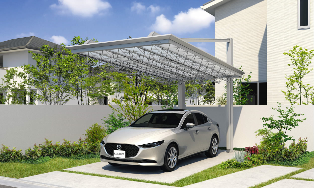 コンパクトなカースペースでも存在感を放つ個性的なフォルム。 後方に柱がある上吊りタイプは柱位置を気にせず駐車や乗り降りができるので、限られたカースペースにぴったり。建物外観に馴染むサンシルバー色のM.シェードIを合わせ、調和の中にも確かな存在感が漂います。　三協アルミ　車庫まわり　カーポート　モダン　おしゃれ　エクステリア　愛知・名古屋の外構専門店パートナーホームのエクステリア　製品一覧　カーポート　M.シェードⅡ上吊りタイプ　施工イメージ|パートナーホーム