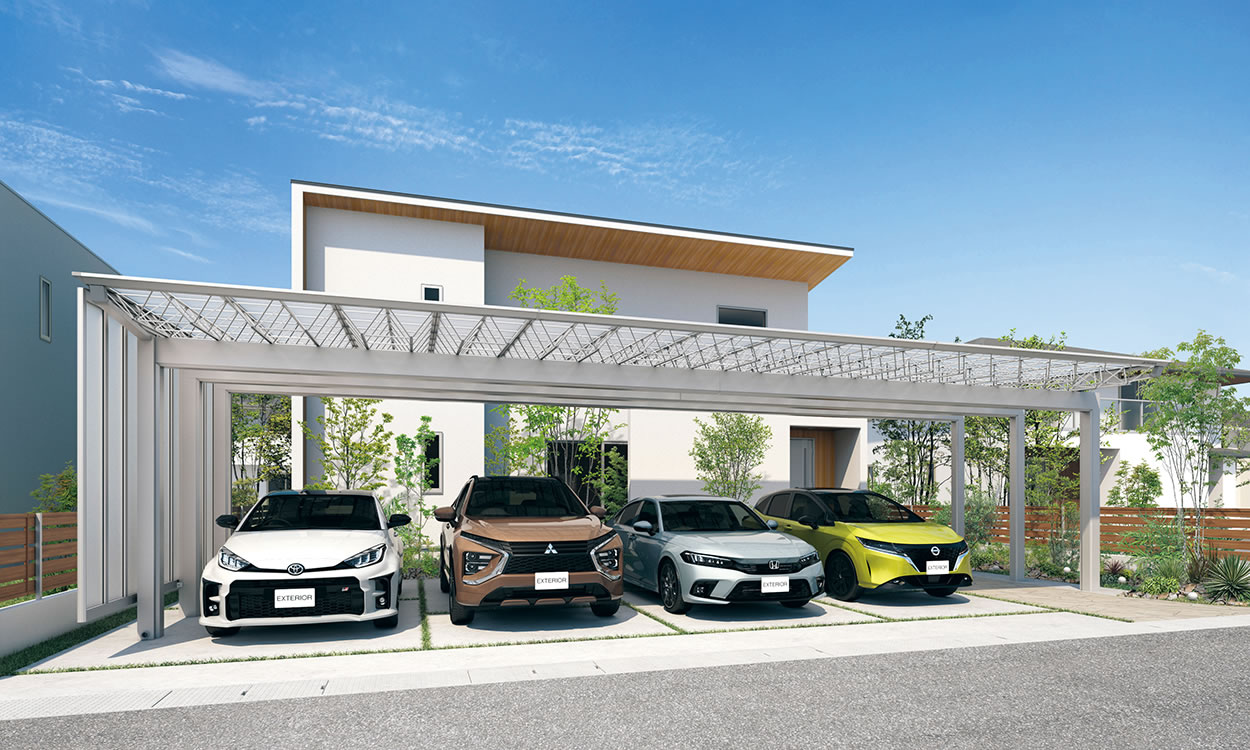 12mの大開ロフレームが生み出す 調和のとれた 上質なファサード空間。 ダイナミックな間口12mのフレームを使い、カースペースとアプローチ全体をカバーし、一体感を演出。M.シェードIIのスタイリッシュなフォルムがファサード空間の印象をさらに高めています。　三協アルミ　車庫まわり　カーポート　モダン　おしゃれ　エクステリア　愛知・名古屋の外構専門店パートナーホームのエクステリア　製品一覧　カーポート　M.シェードⅡ　梁置きタイプ|パートナーホーム